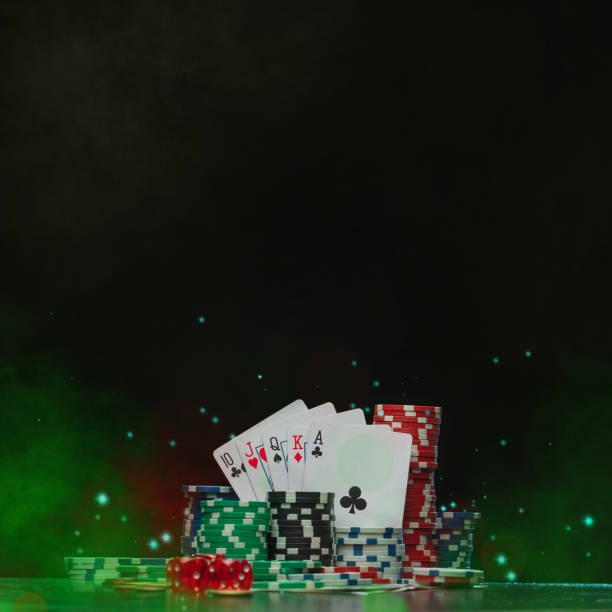 Sic Bo table with three dice, betting board, and payoff chart visible
